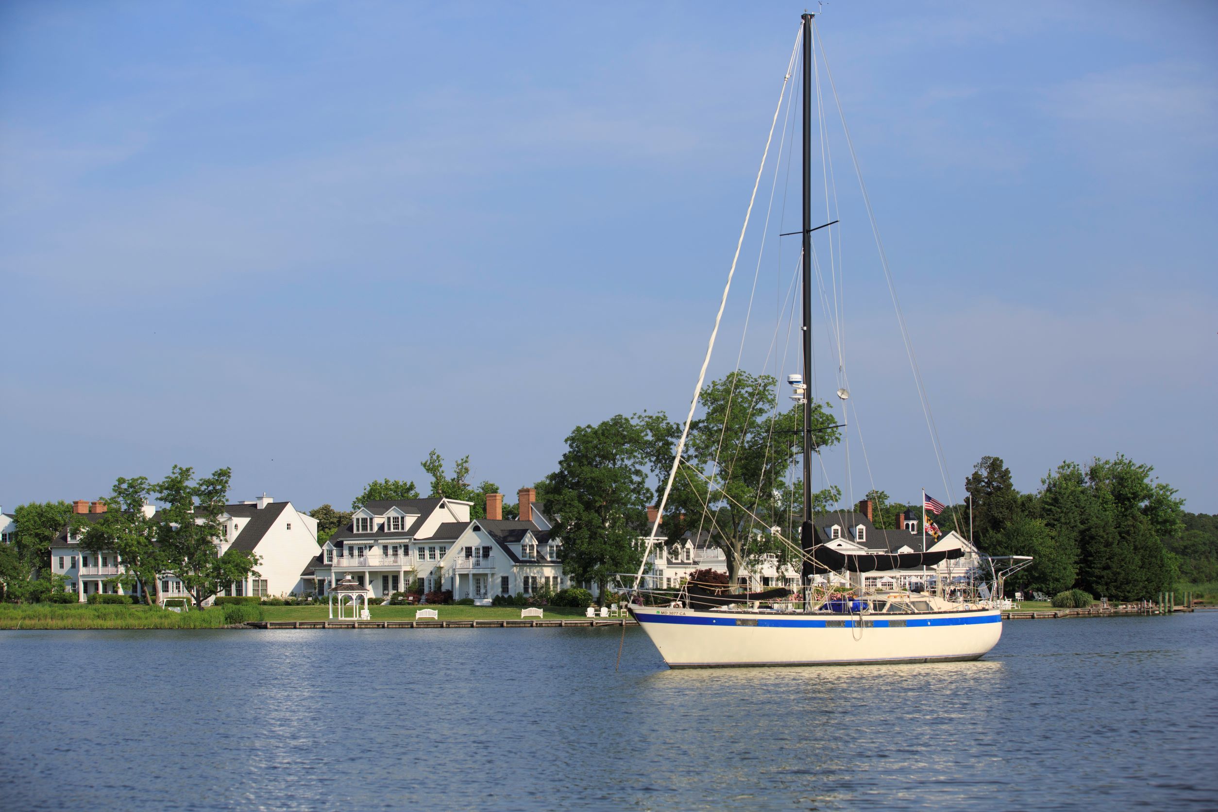 Michael's sailboat in front of Waterside Inn
