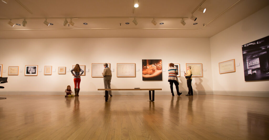 Visitors viewing an exhibition at the Academy Art Museum in Easton, Maryland.