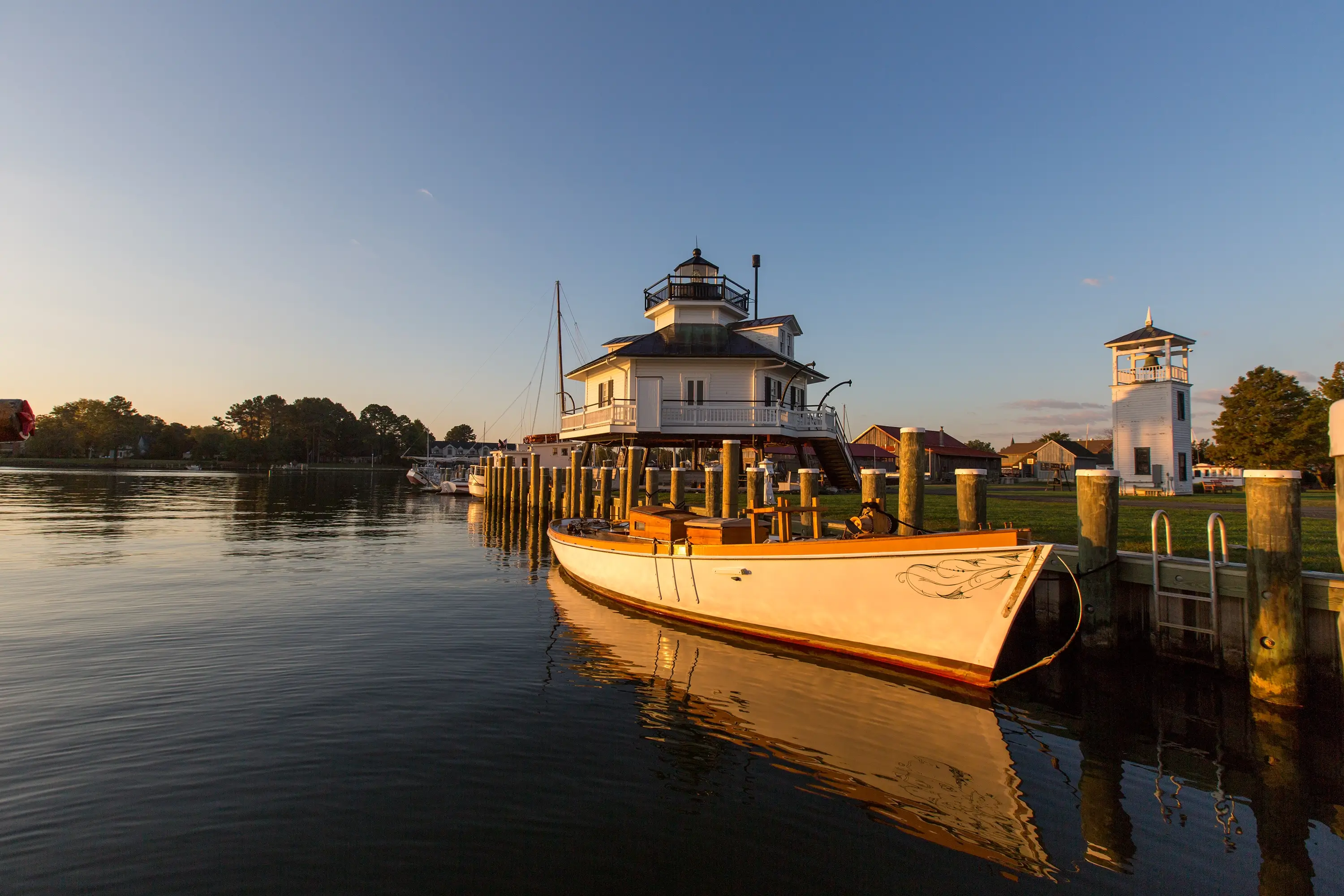 St. Michaels lighthouse and boat in fall Talbot County.