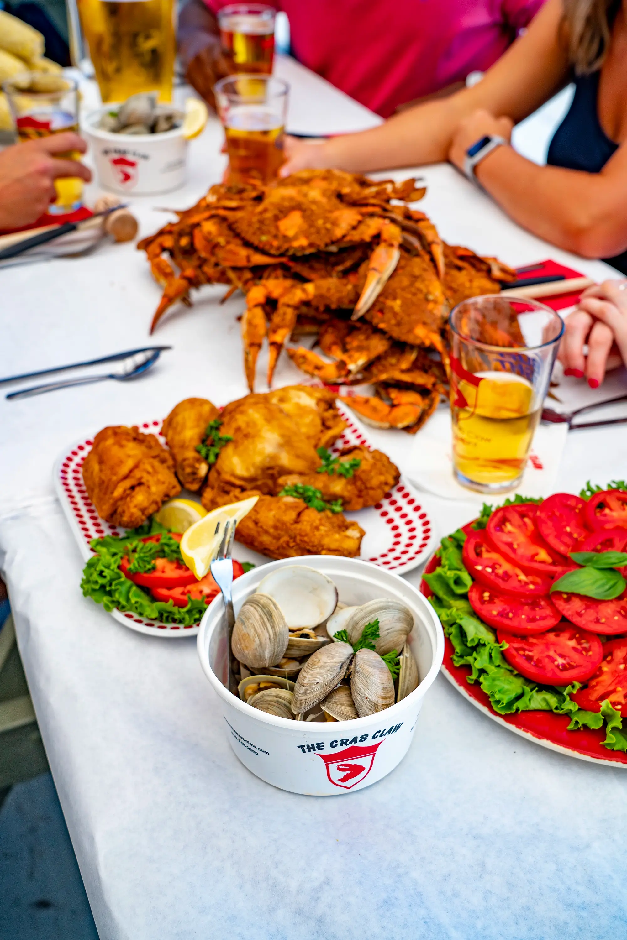 A seafood table with crab and beer in Talbot County.