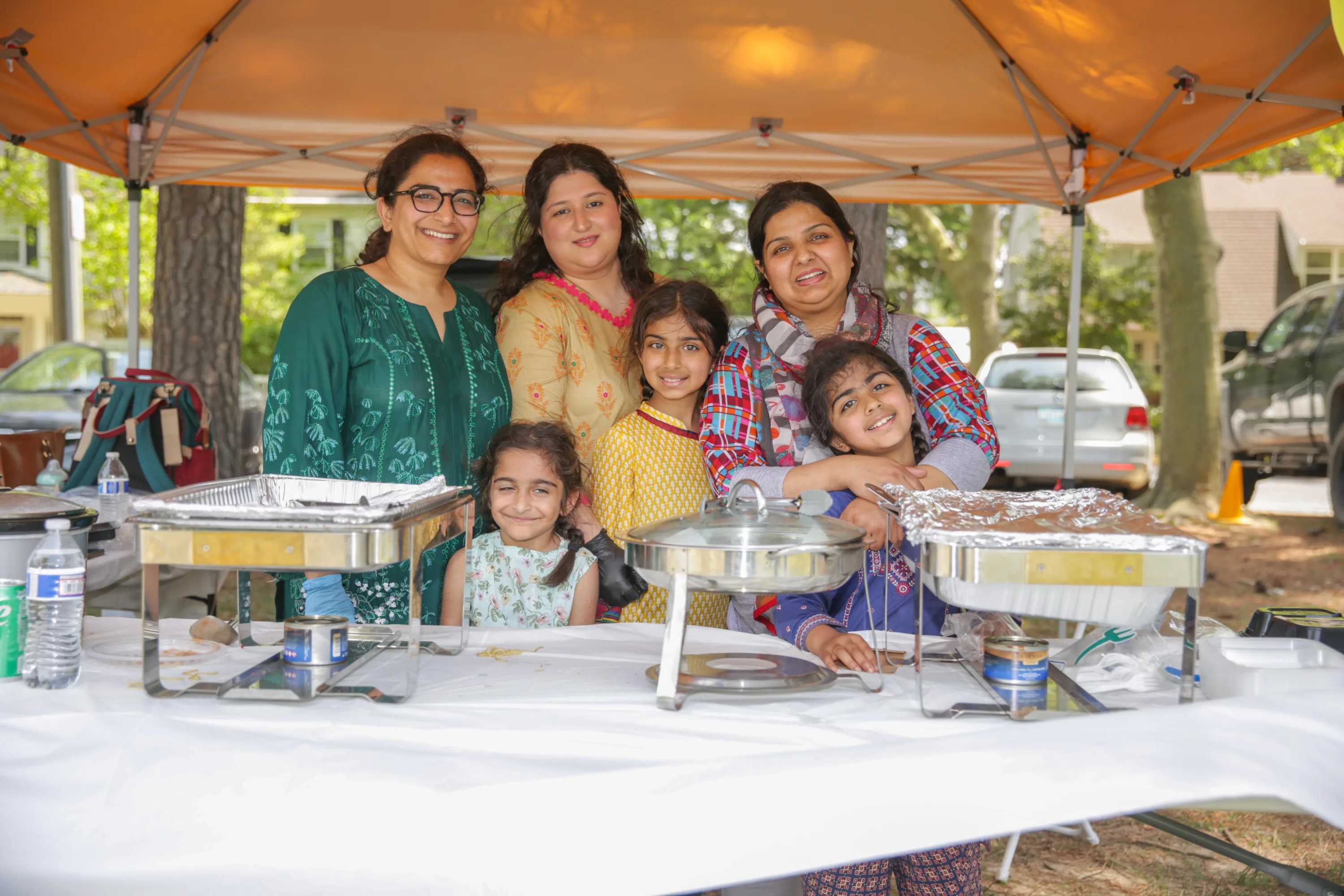 Family of women, serving as a food vendor at the Easton Multicultural Festival
